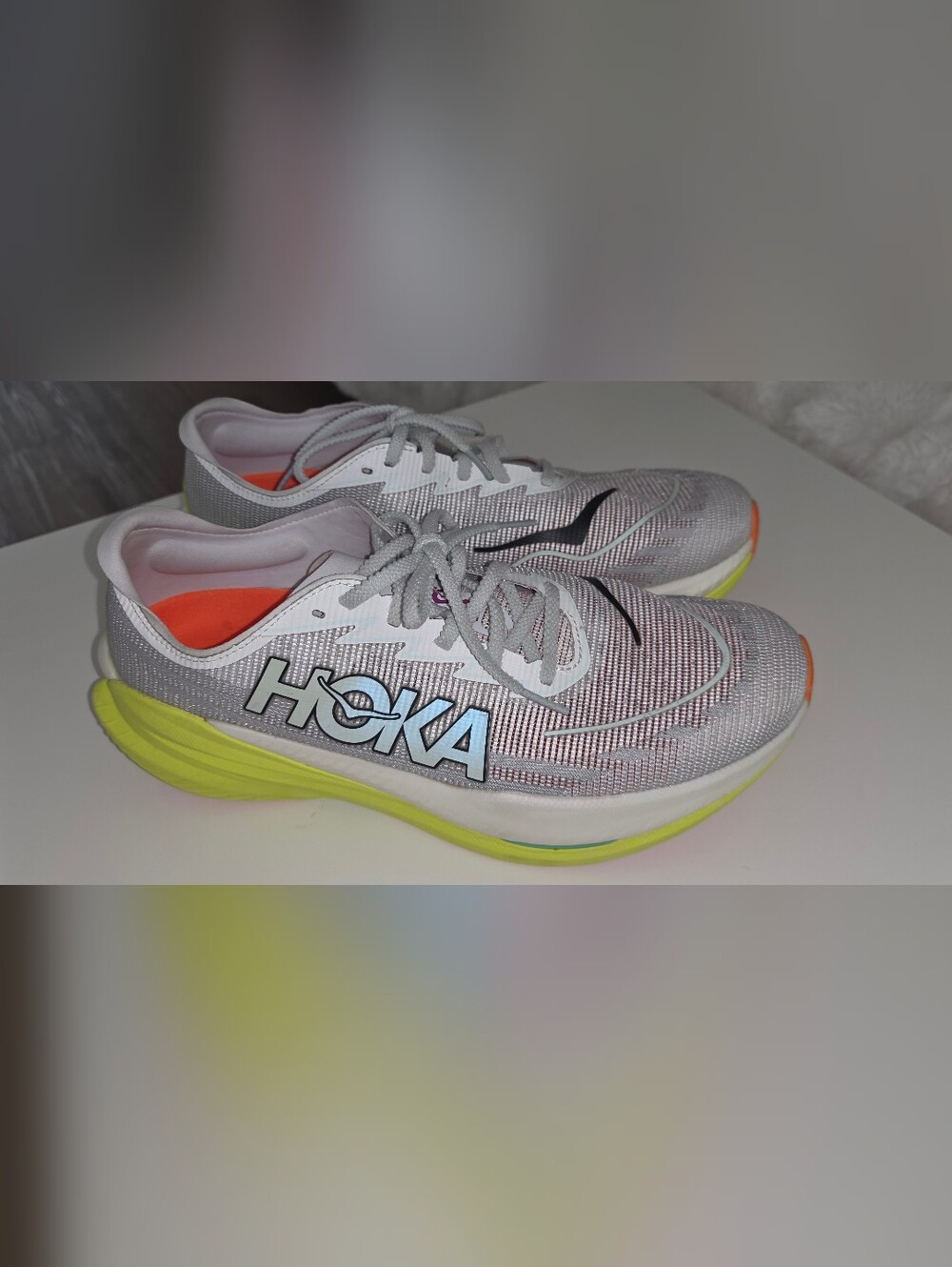 Hoka Men's Silver Mesh Running Shoes with Neon Yellow Midsole and Orange Accents
